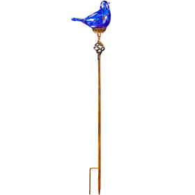 Naboher garden scene with bird stake creates a charming yard focal point