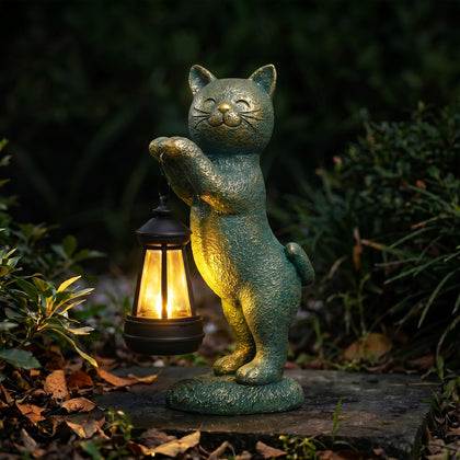 Nacome Christmas cat outdoor statue with lantern lighting the garden at dusk