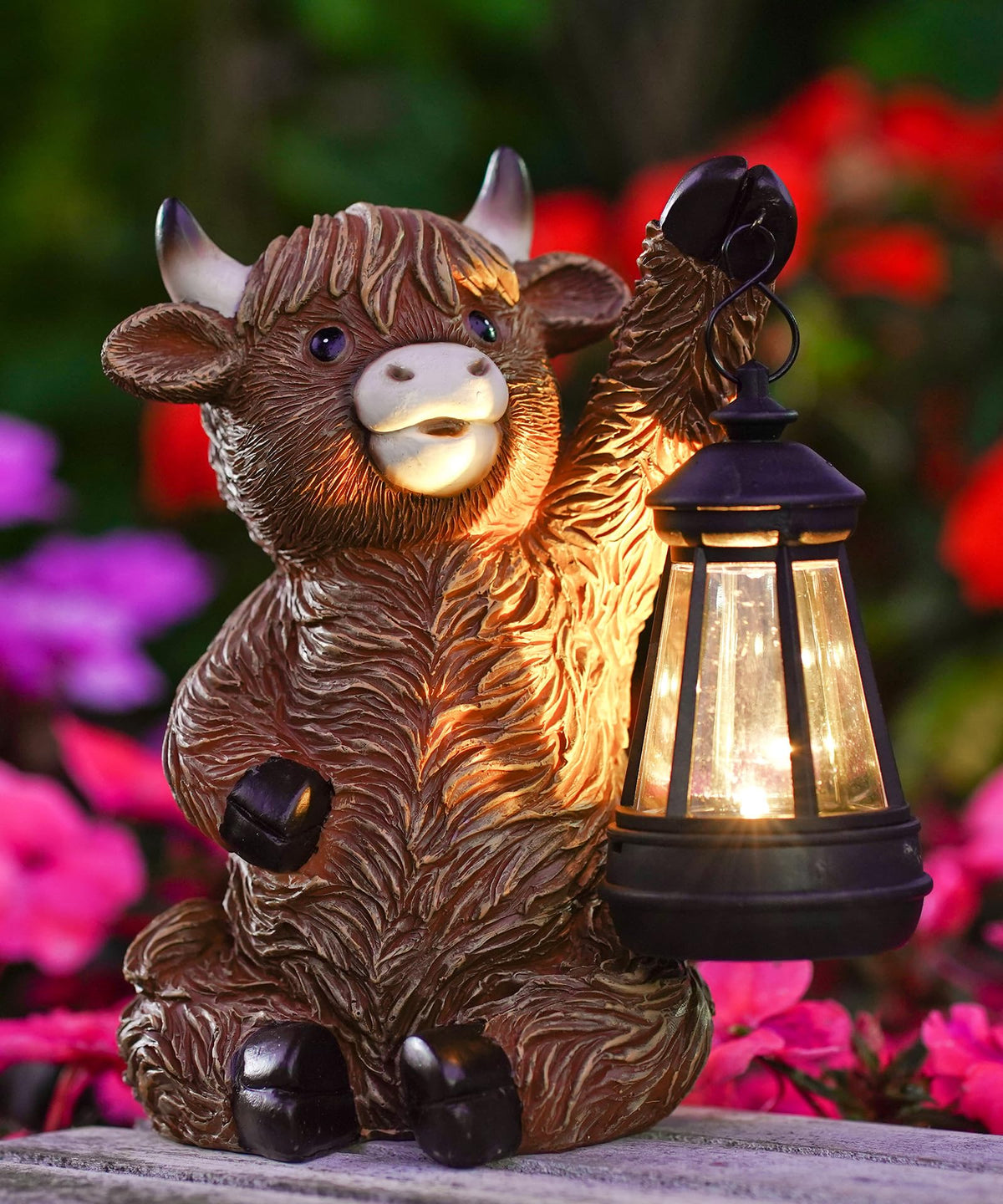 Nacome Highland Cow lawn ornament brings playful charm to outdoor spaces.