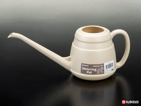 Nakaya watering can featuring ergonomic handle for comfortable garden use.