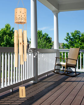 Nanatoc wind chimes at night with ambient solar glow and gentle sounds.
