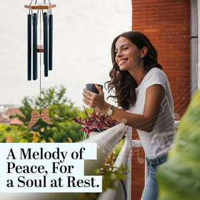 Naomi Catherine Designs wind chimes in garden display for outdoor remembrance.