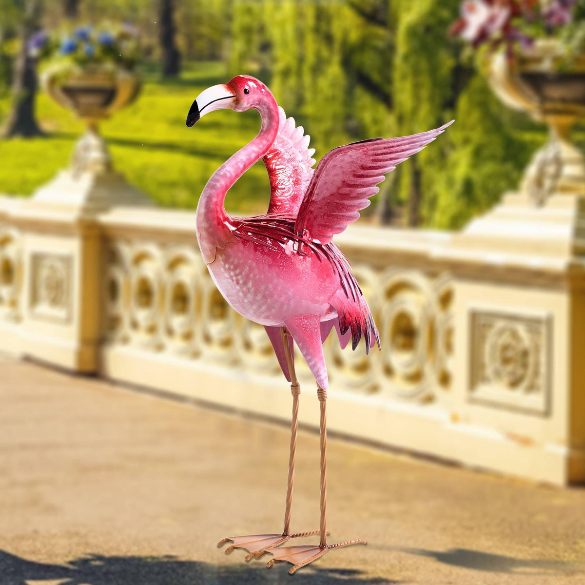 Natelf flamingo statue with dual stakes stands sturdy on most surfaces.