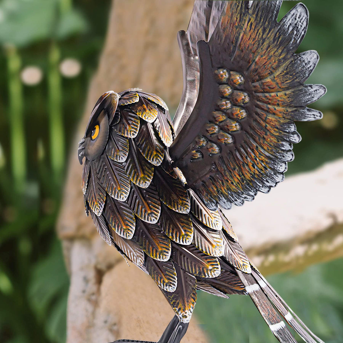 Natelf owl sculpture sparkling in sunlight; a charming gift idea.
