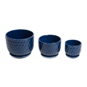 Nattol planter with attached saucer keeps surfaces clean and tidy.