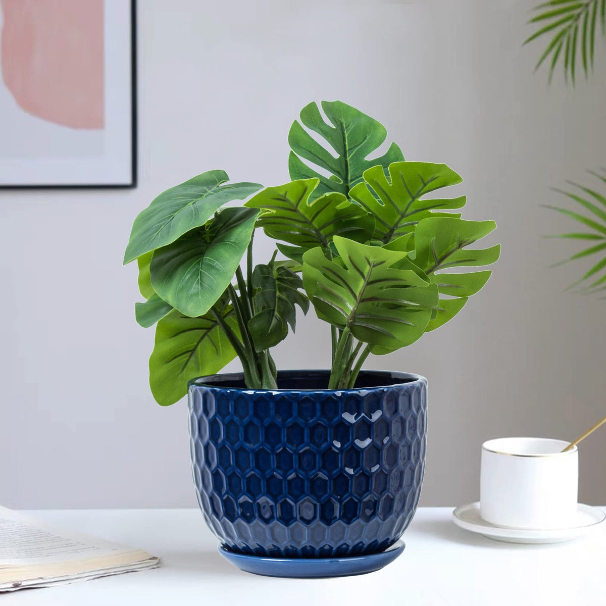 Nattol small navy blue pot fits tight spaces and windowsills.