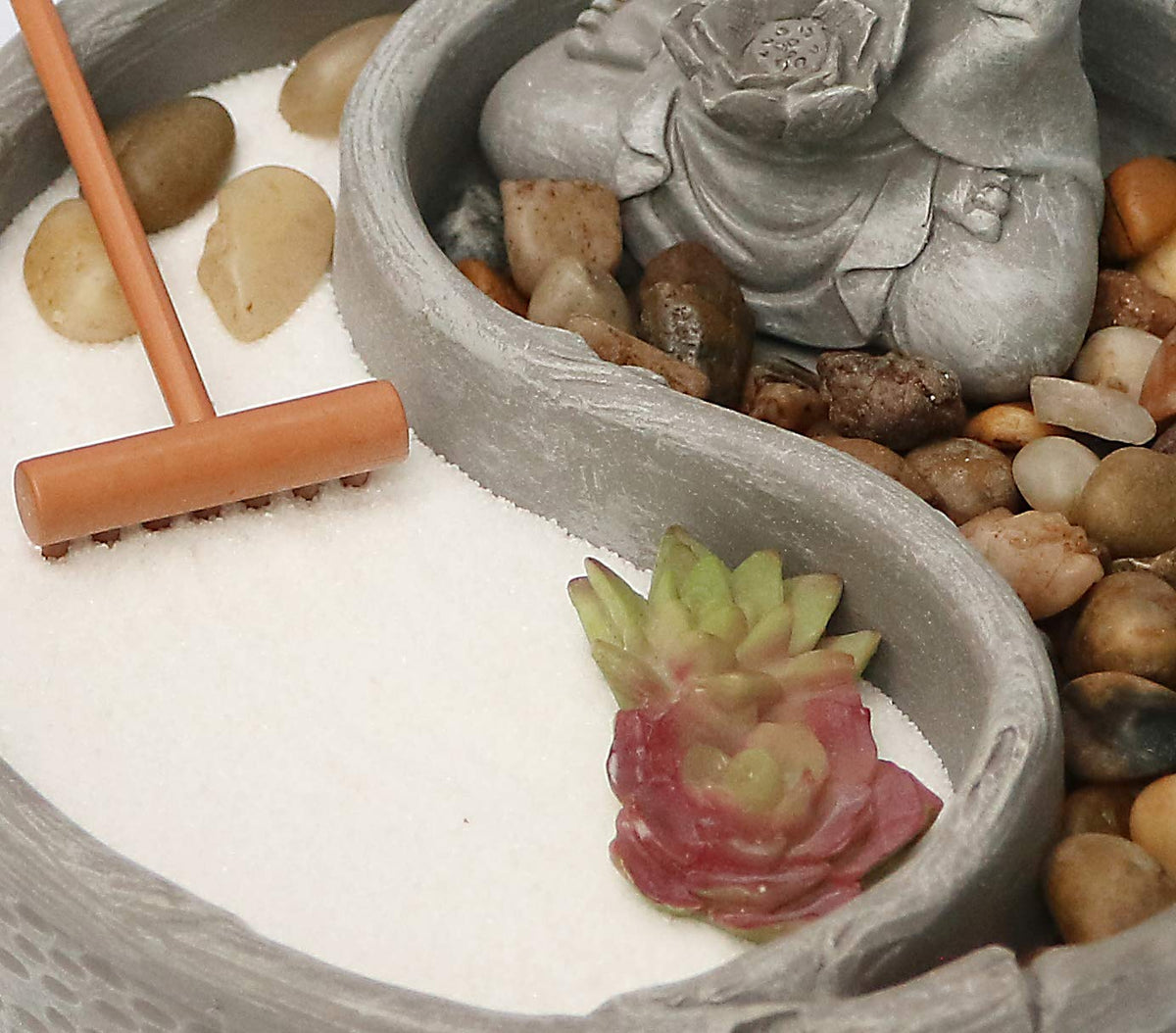 Buddha statue centerpiece for contemplation in the Zen garden