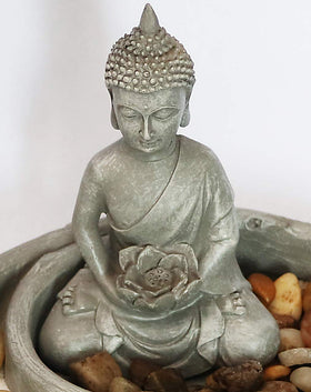 Faux lotus adds color and serenity to the mini landscape