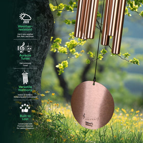 Aureole Tunes wind chimes enhancing a sunny outdoor garden scene