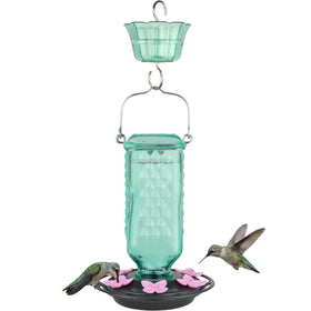 Nature’s Way Dewdrop Column teal glass reservoir attracts hummingbirds while aiding bee resistance.