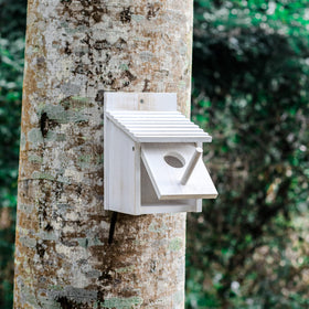 Natureylwl hanging bird house suited for trees, patios, or decks.