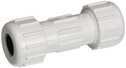 NDS CPC-0500 PVC compression coupling on half-inch IPS pipes, enabling a leak-resistant, quick-seal connection.