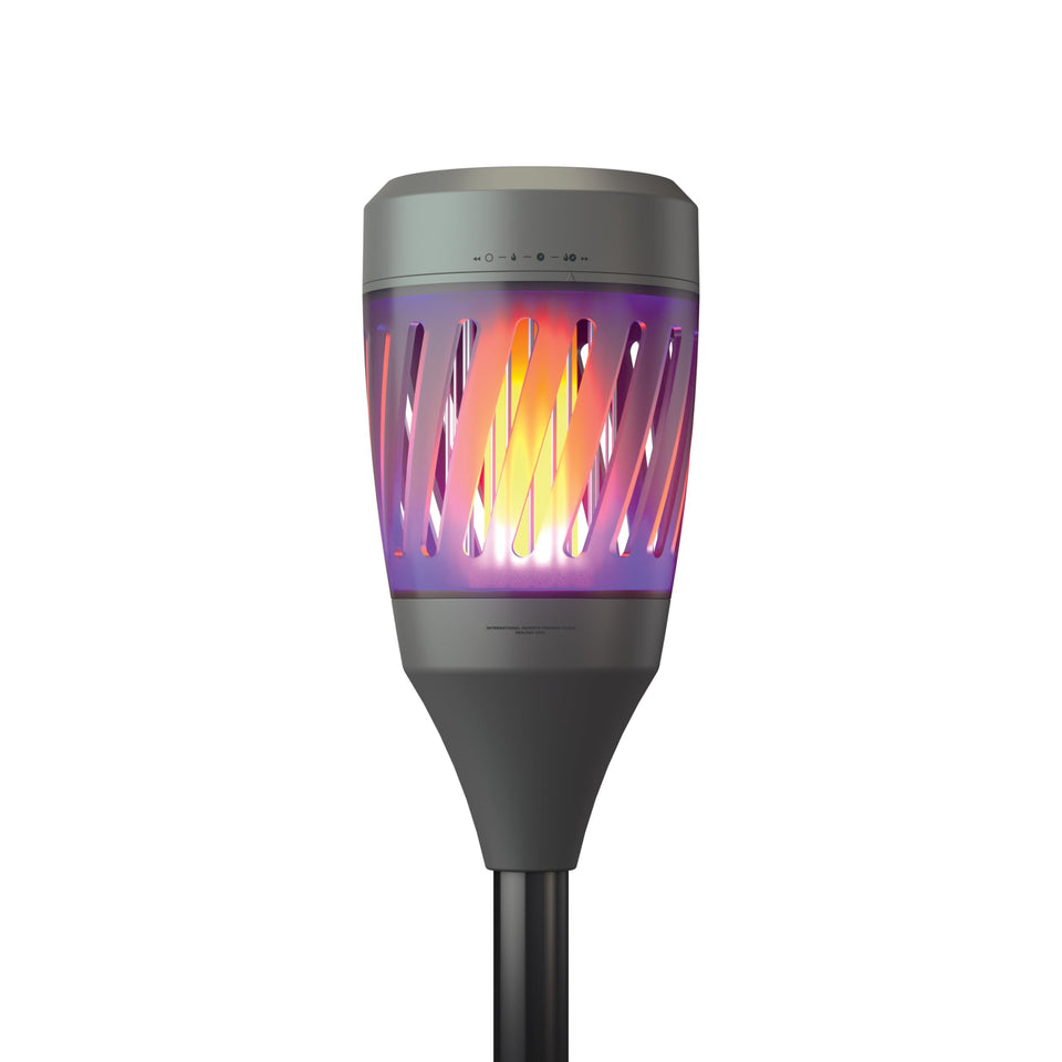 NEBO Solar Torch Zapper front view with warm ambient light for outdoor nights