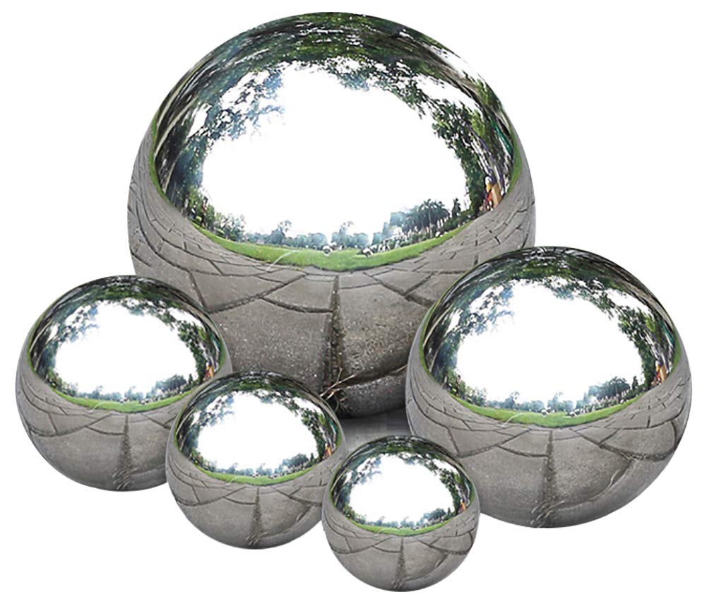 Nerien gazing ball 40mm polished silver reflects surrounding interiors with clarity.