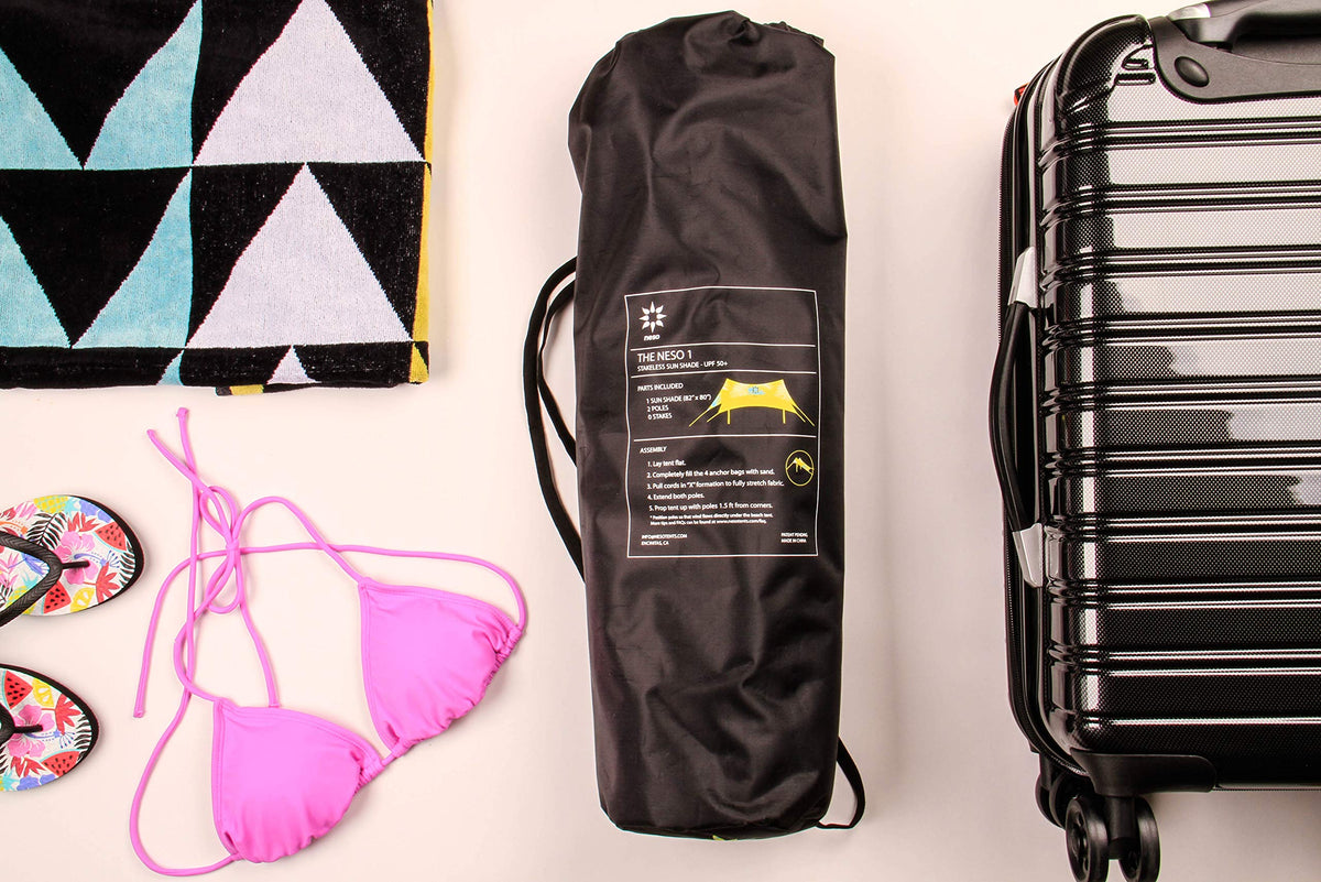 Neso sand-anchor bags secure shade using natural beach resources