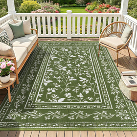 nesrt outdoor rug in olive green is waterproof and patio-ready
