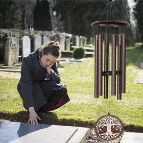 NETAEX wind chimes display engraved verse tag inviting reflection with every breeze.