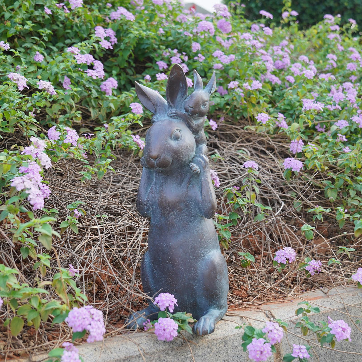 Newman House Studio Family bunny statue brightens patios and porches.