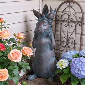 Newman House Studio Rabbit Garden Statue enhances outdoor spaces with seasonal charm.