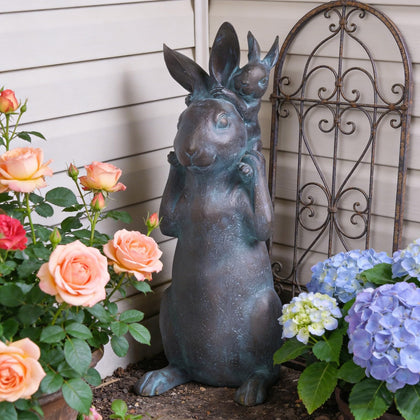 Newman House Studio Rabbit Garden Statue enhances outdoor spaces with seasonal charm.