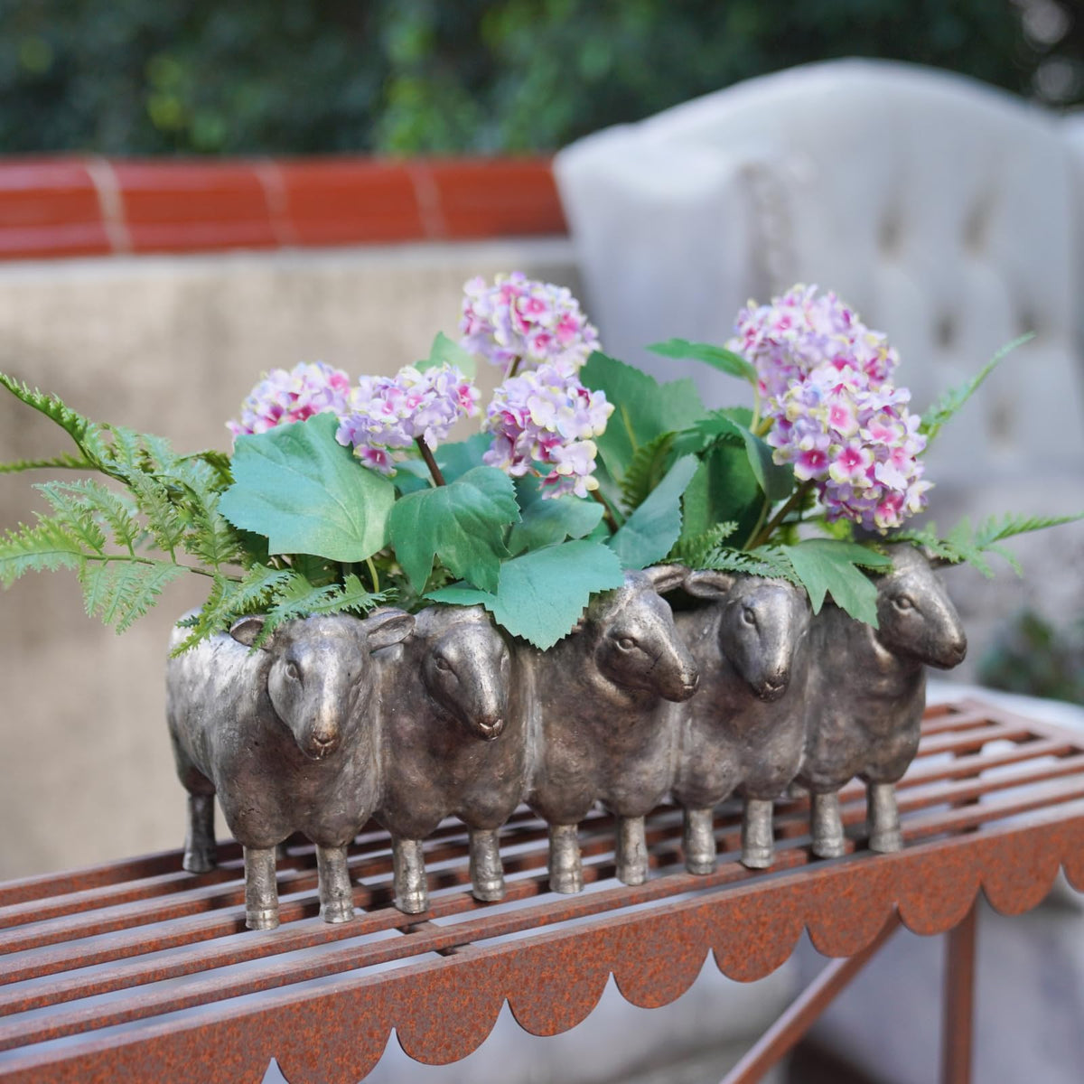 Newman House Studio Resin Sheep Planter side view highlights gunmetal finish