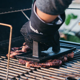 Nexgrill oven mitt highlighting the canvas lower portion for durability.