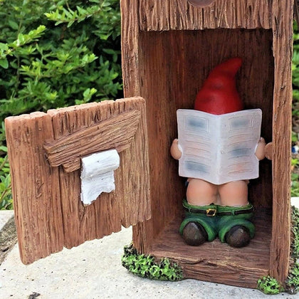 nezababy reading-newspaper-gnome adds playful charm to outdoor spaces