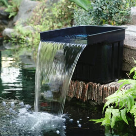 NFESOLAR hidden waterfall box blends with landscaping for a natural look.