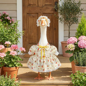 Ngdhkd lace-edged goose costume adds refined detail to outdoor displays.