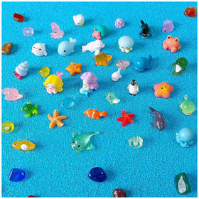 NIBERDA ocean mini resin dolphins for tiny fairy gardens and micro aquariums.