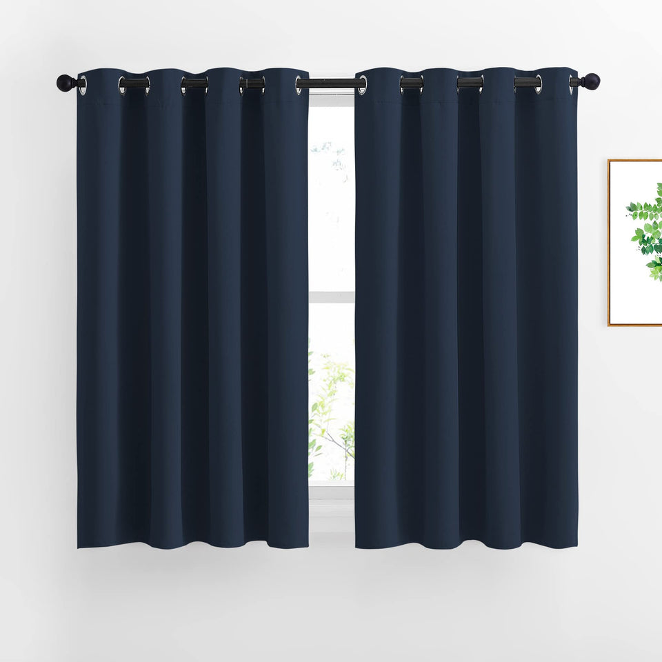 NICETOWN blackout curtain panel closeup shows dense fabric and polished grommets for a refined look