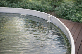 NickHouse bent-pressure-clip uses tension to push the top into the rim