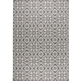 Nicole Miller New York Patio Country Danica rug with floral accents brightens decks.