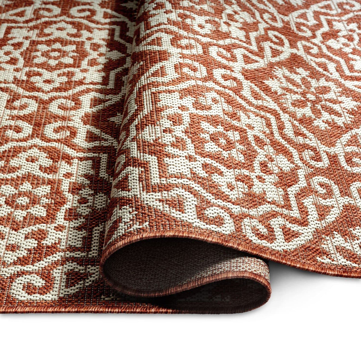 Rug placed in an entry or patio corner adds style.