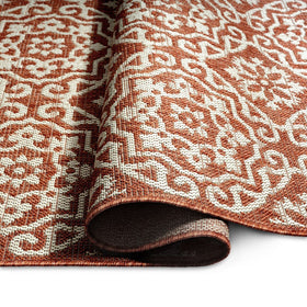 Rug placed in an entry or patio corner adds style.