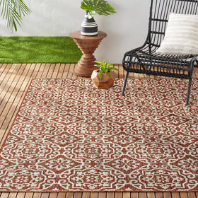 Nicole Miller New York Patio Country Danica rug; terracotta ivory motif for outdoor spaces.