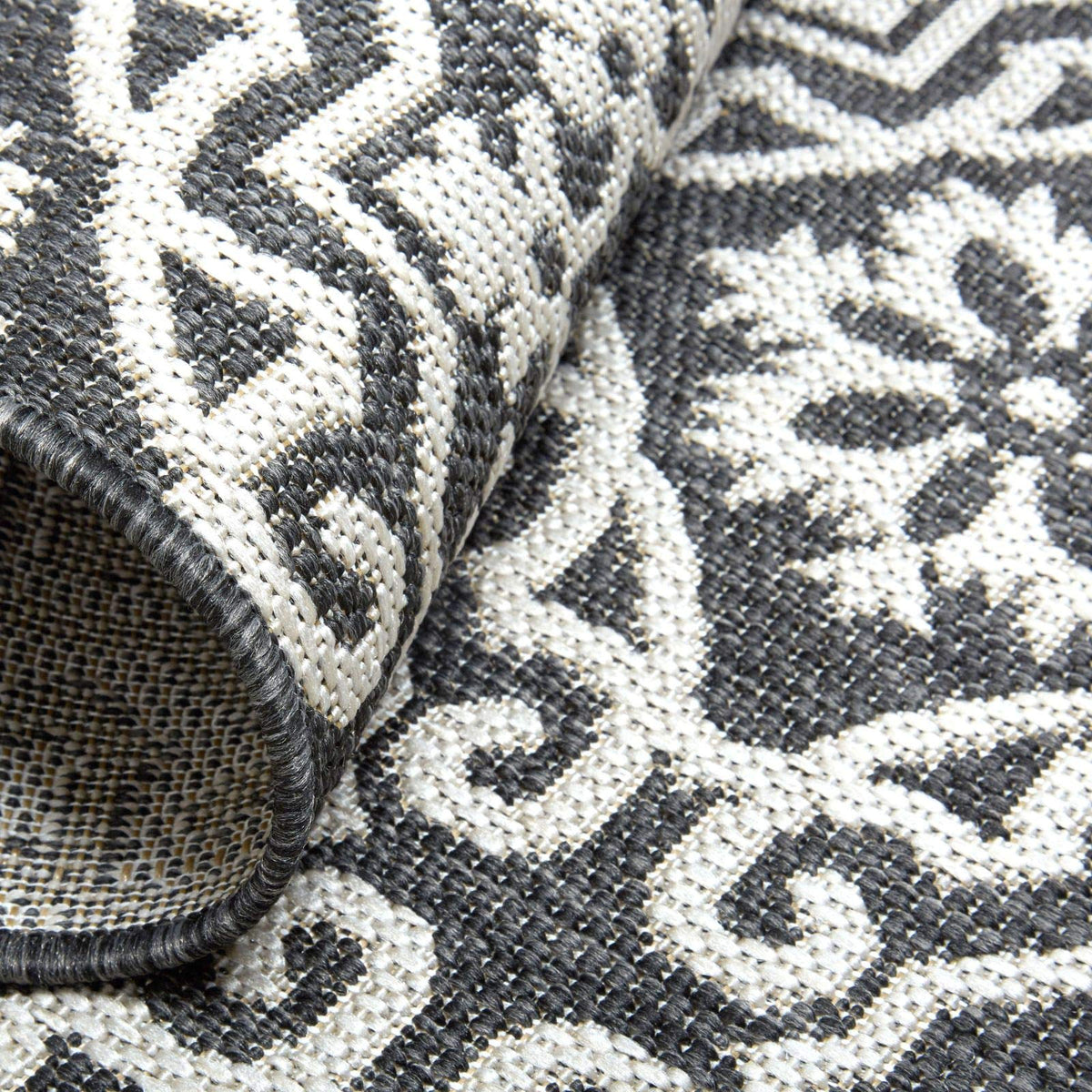 Nicole Miller New York Patio Country Danica weather-resistant rug for outdoor spaces.