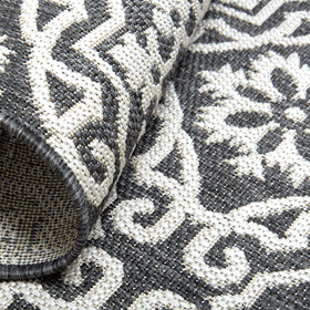 Nicole Miller New York Patio Country Danica weather-resistant rug for outdoor spaces.