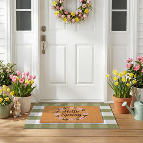 NIIKOOS green-white plaid layering rug complements the coir mat for stylish entryways