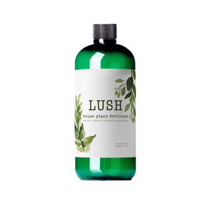 NilocG Lush Houseplant Fertilizer bottle pour demonstrates easy dilution for vibrant foliage.