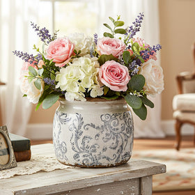 Beige glaze with gray floral motif on Ninehaoou vintage planter.