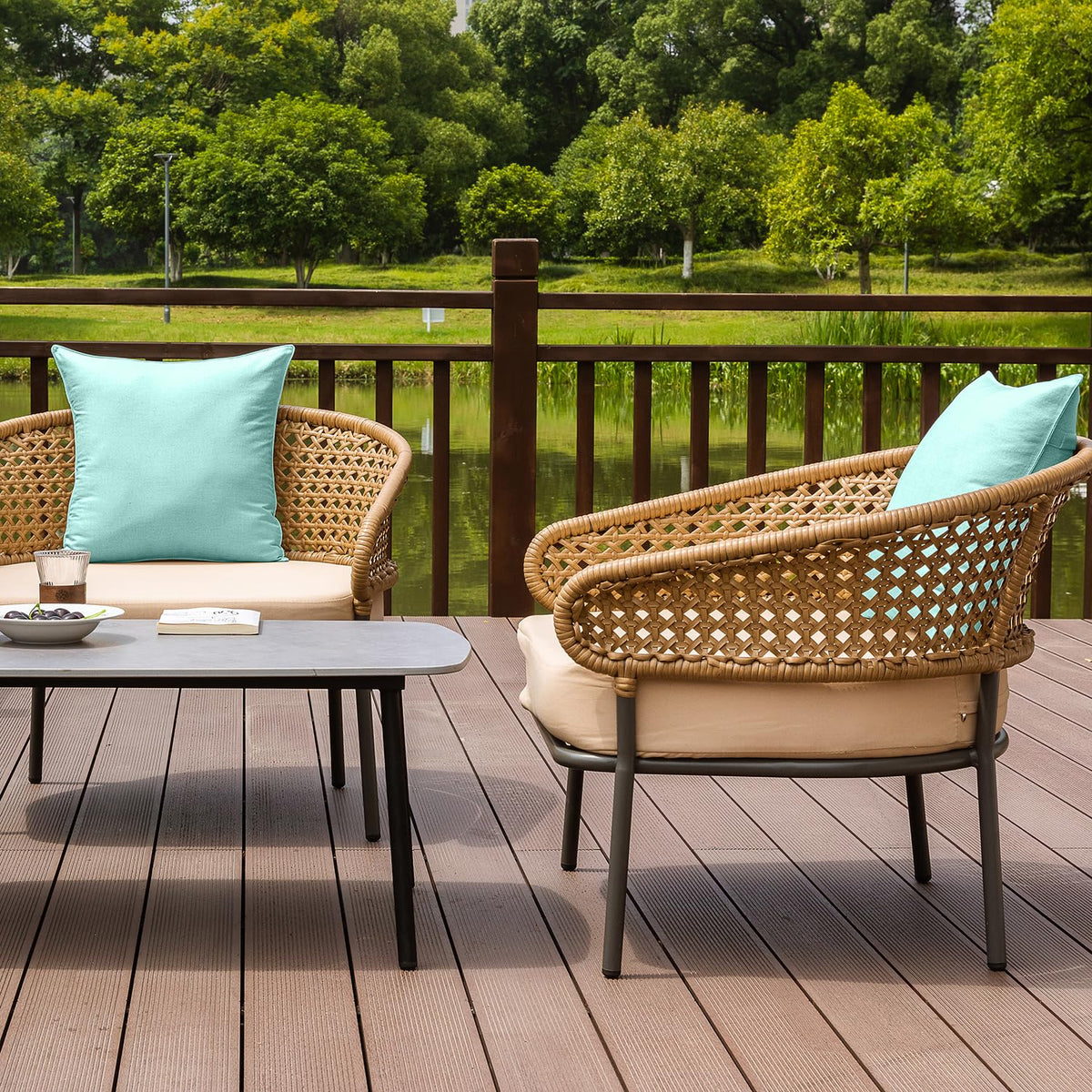 NiNi ALL lake blue pillow cover showcased in garden or patio setup.