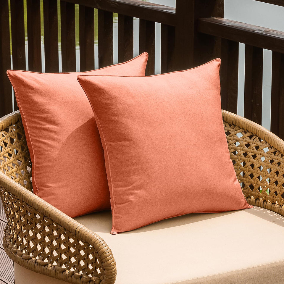 NiNi ALL orange outdoor waterproof pillow cover on a patio cushion