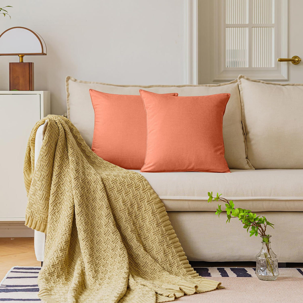 NiNi ALL orange pillow cover at poolside lounge area