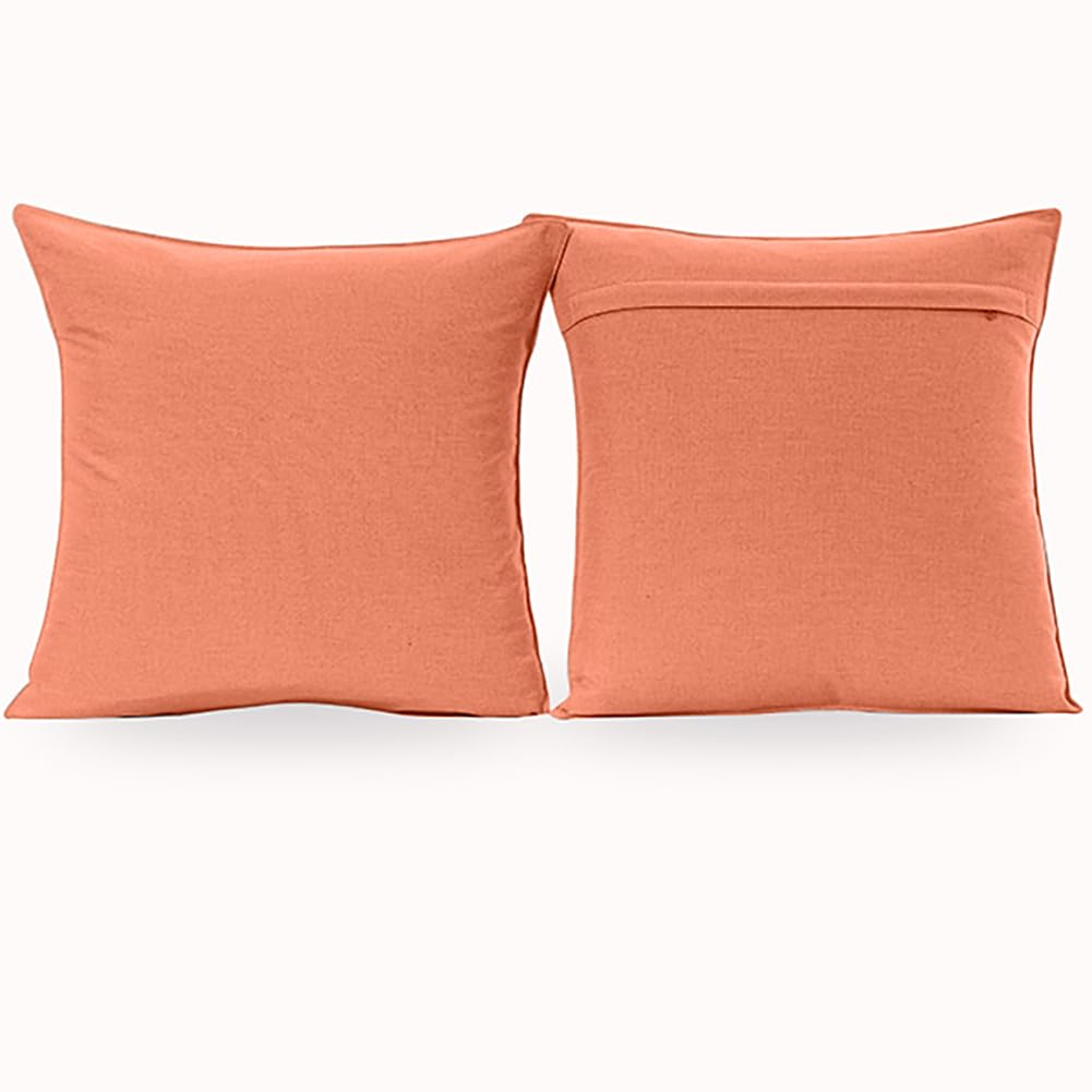 NiNi ALL orange pillow cover on tent seating outdoors
