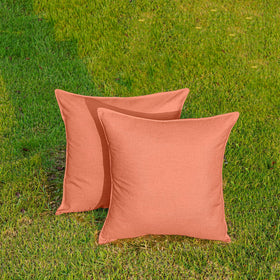 NiNi ALL orange cushion cover used at an outdoor wedding setting