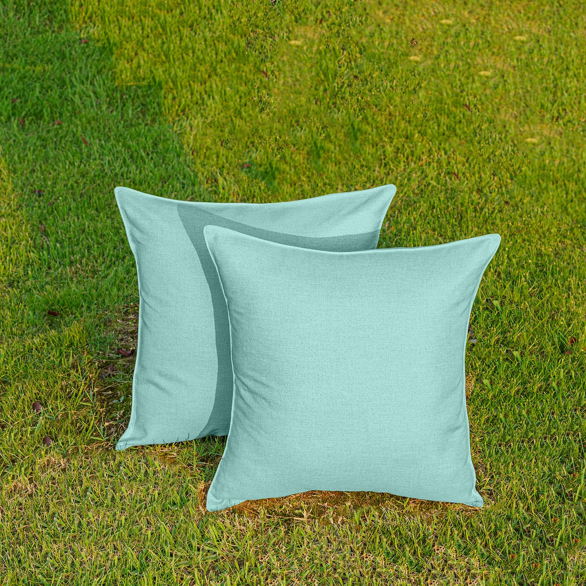 NiNi ALL outdoor pillow cover on poolside lounge in lake blue.