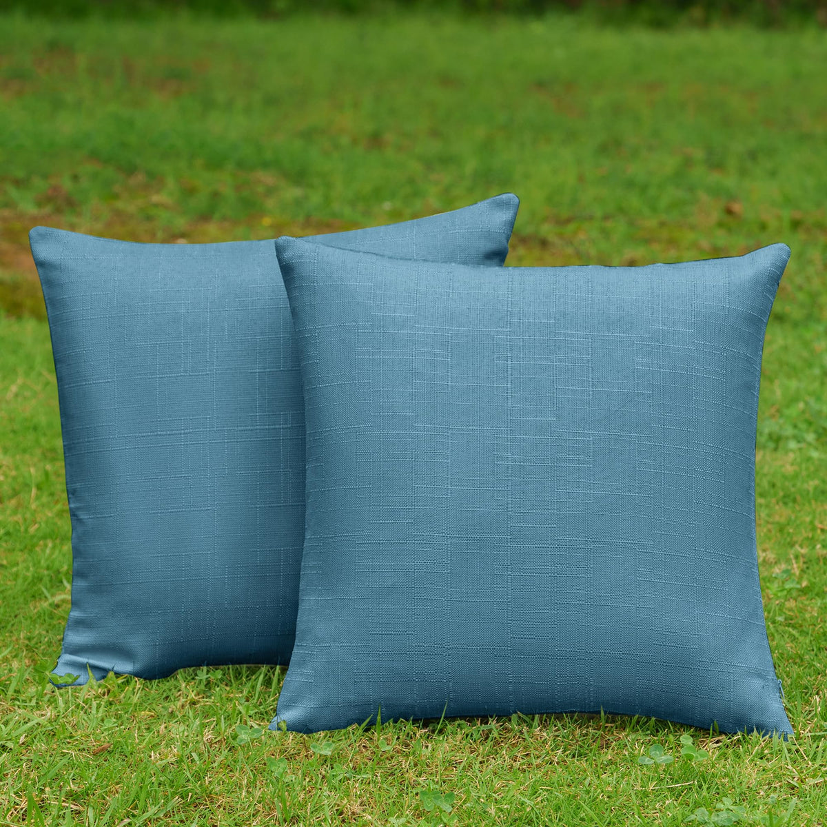 NiNi ALL waterproof pillow cover showing deep blue textile texture outdoors