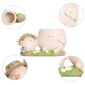 NINIPAPA head planter with succulent arrangement adds character