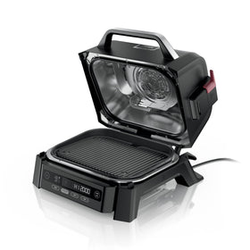 Ninja Woodfire grill front view showing rugged outdoor design for year-round cooking